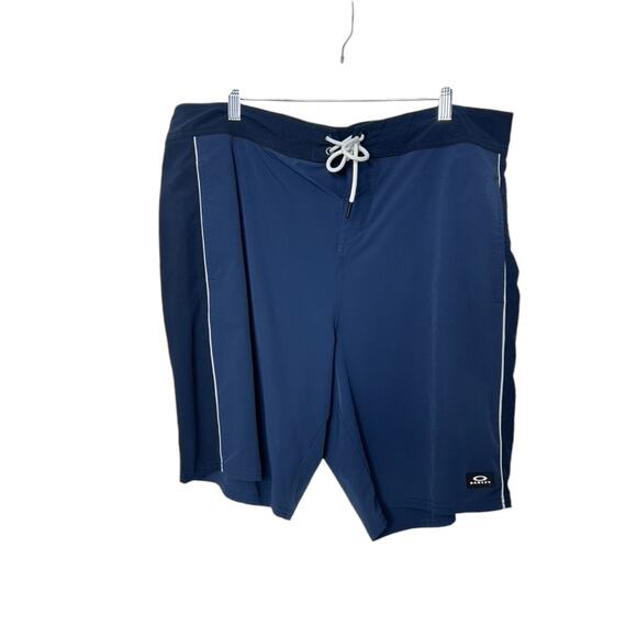 OAKLEY Navy Blue PERFORMANCE Fit 10" Shorts Men's Size 38 Tie Front - Picture 1 of 8